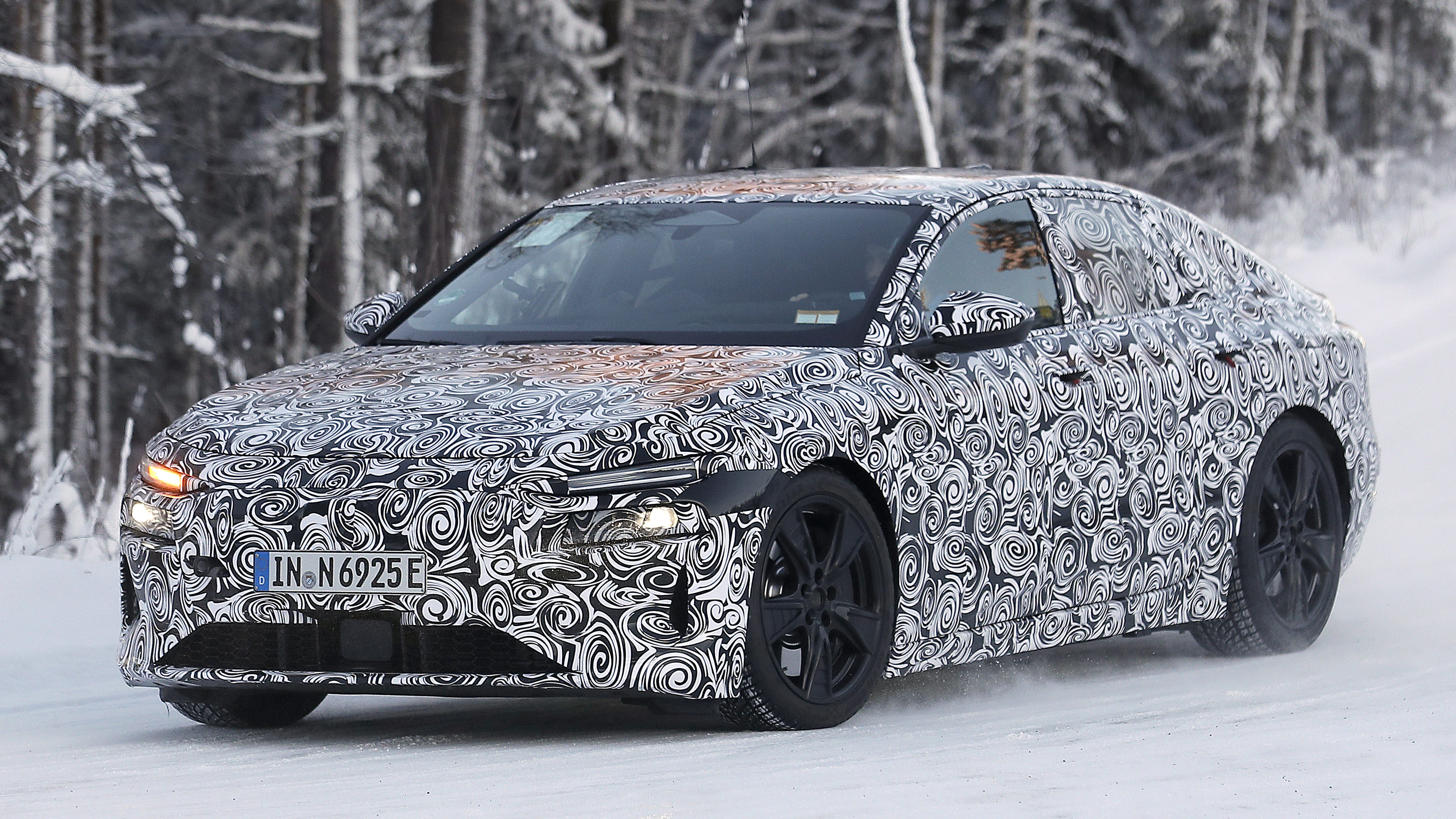 Audi A6 e-tron spy picture front three-quarter snow