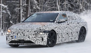 Audi A6 e-tron spy picture front three-quarter snow