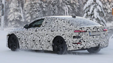Audi A6 e-tron spy picture rear three-quarter snow