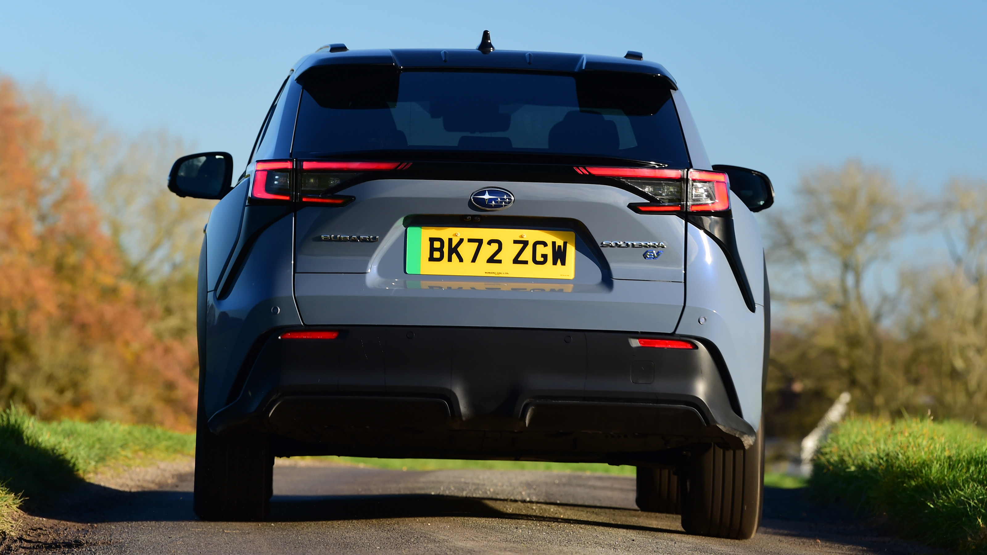 Subaru Solterra driving rear