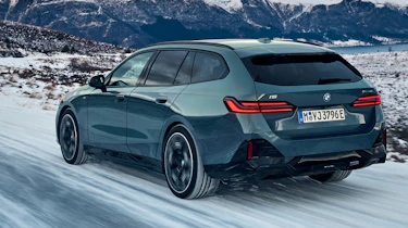 BMW i5 Touring - rear dynamic