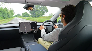 Jordan Katsianis driving the Tesla Model 3 Performance