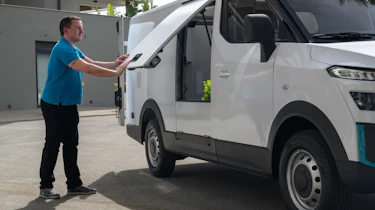 Senior content editor Shane Wilkinson operating the B-ON Pelkan's side door