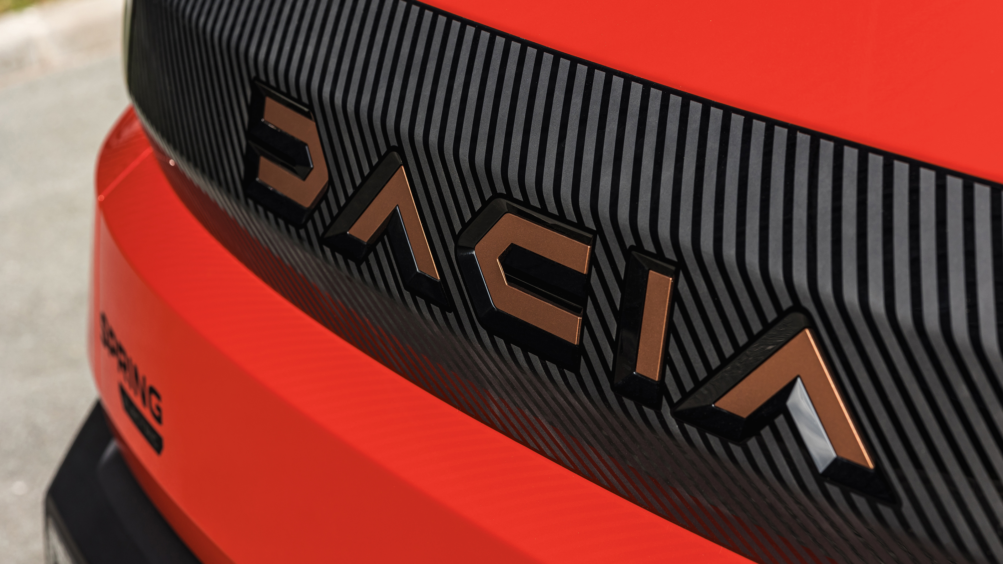 Dacia Spring - tailgate badging