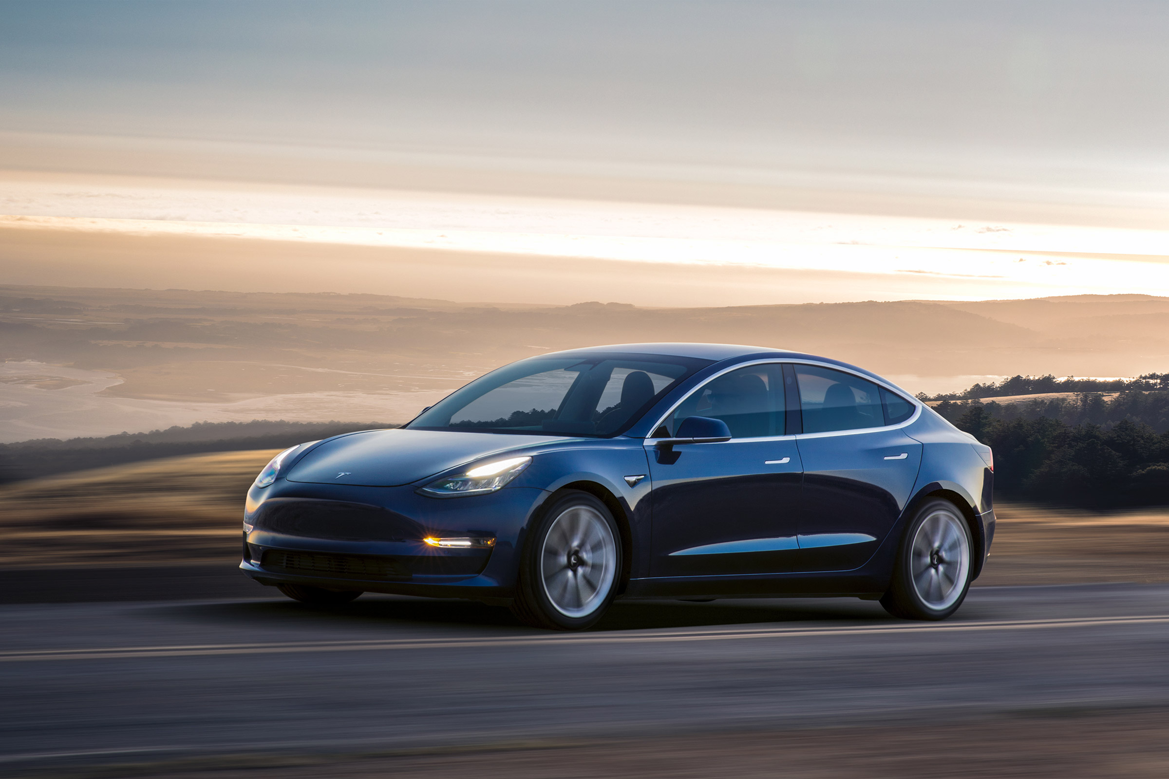 Tesla Model 3 driving