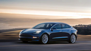 Tesla Model 3 driving